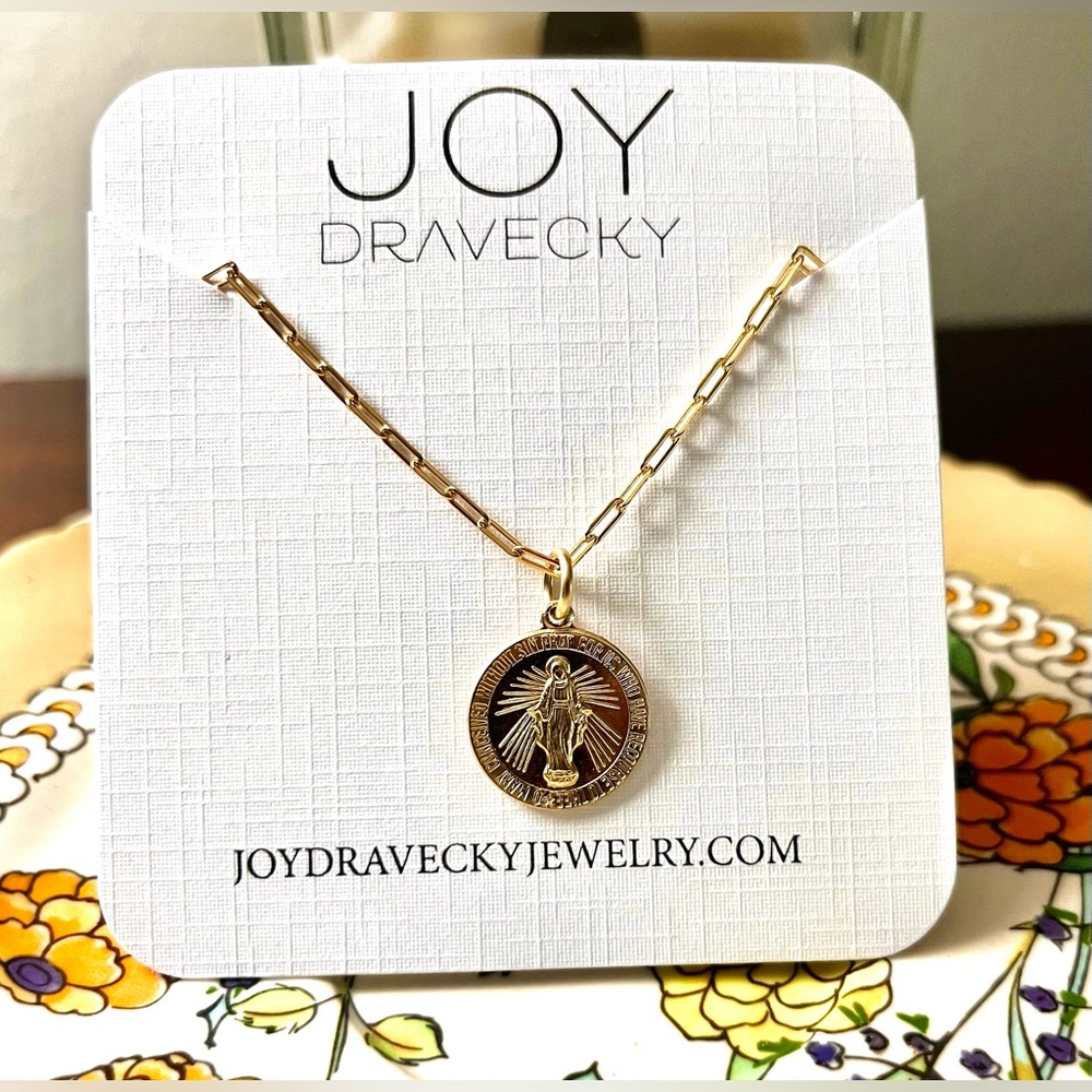 The Miraculous medal necklace, also known as the Medal of Lady Graces